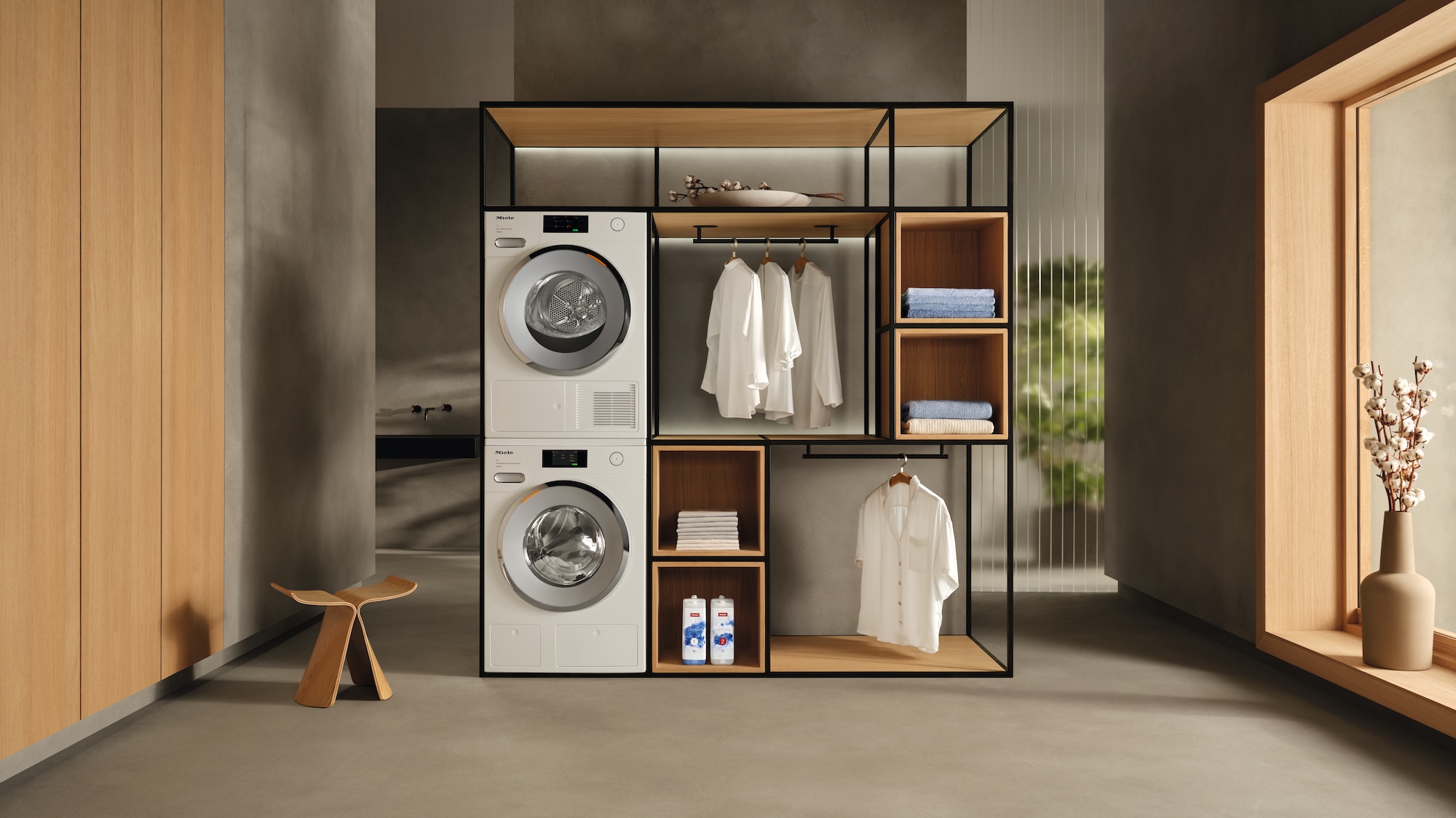 Miele washing machine and dryer on display in a laundry room